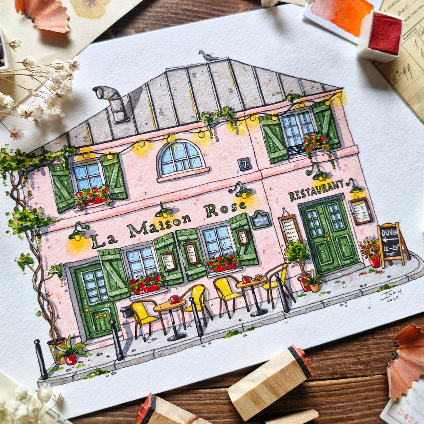Watercolour illustration of a building labeled 'La Maison Rose' in Paris. Original watercolour art
