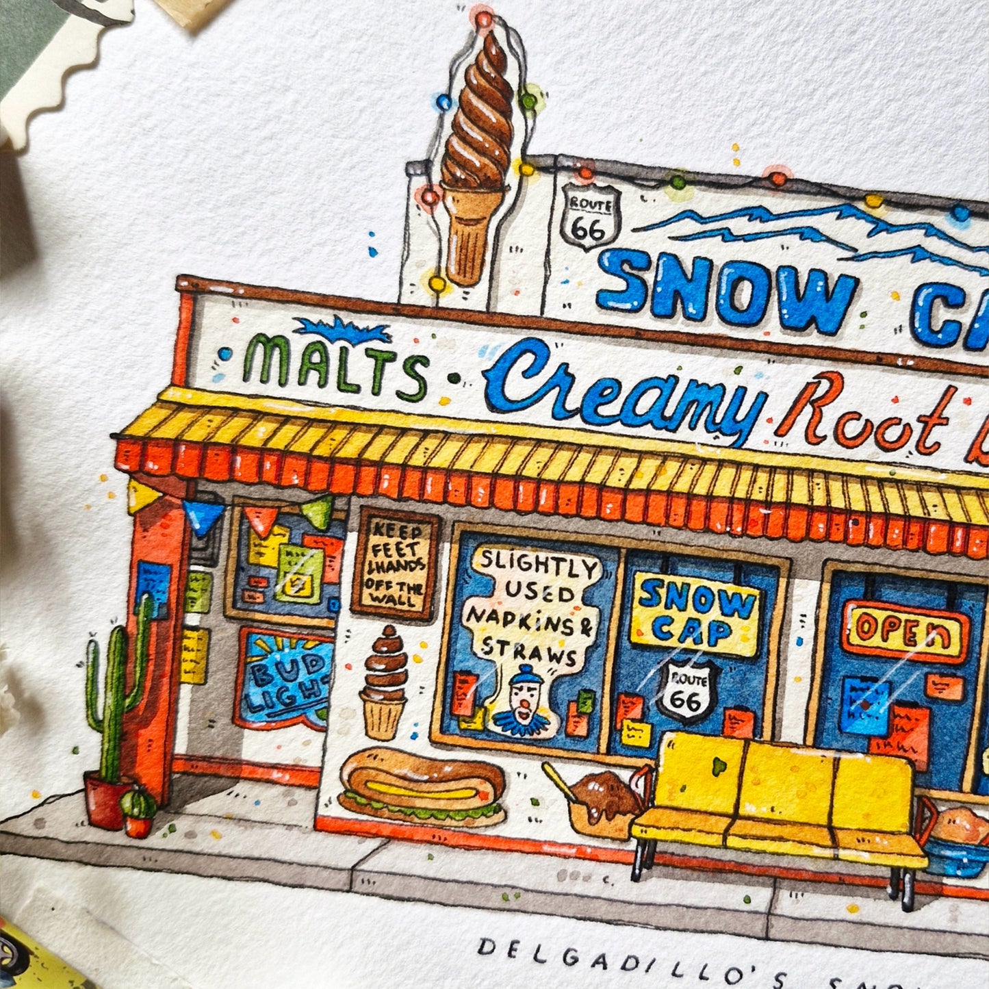 Illustration of a snow cap ice cream shop with colorful signage and graphics.