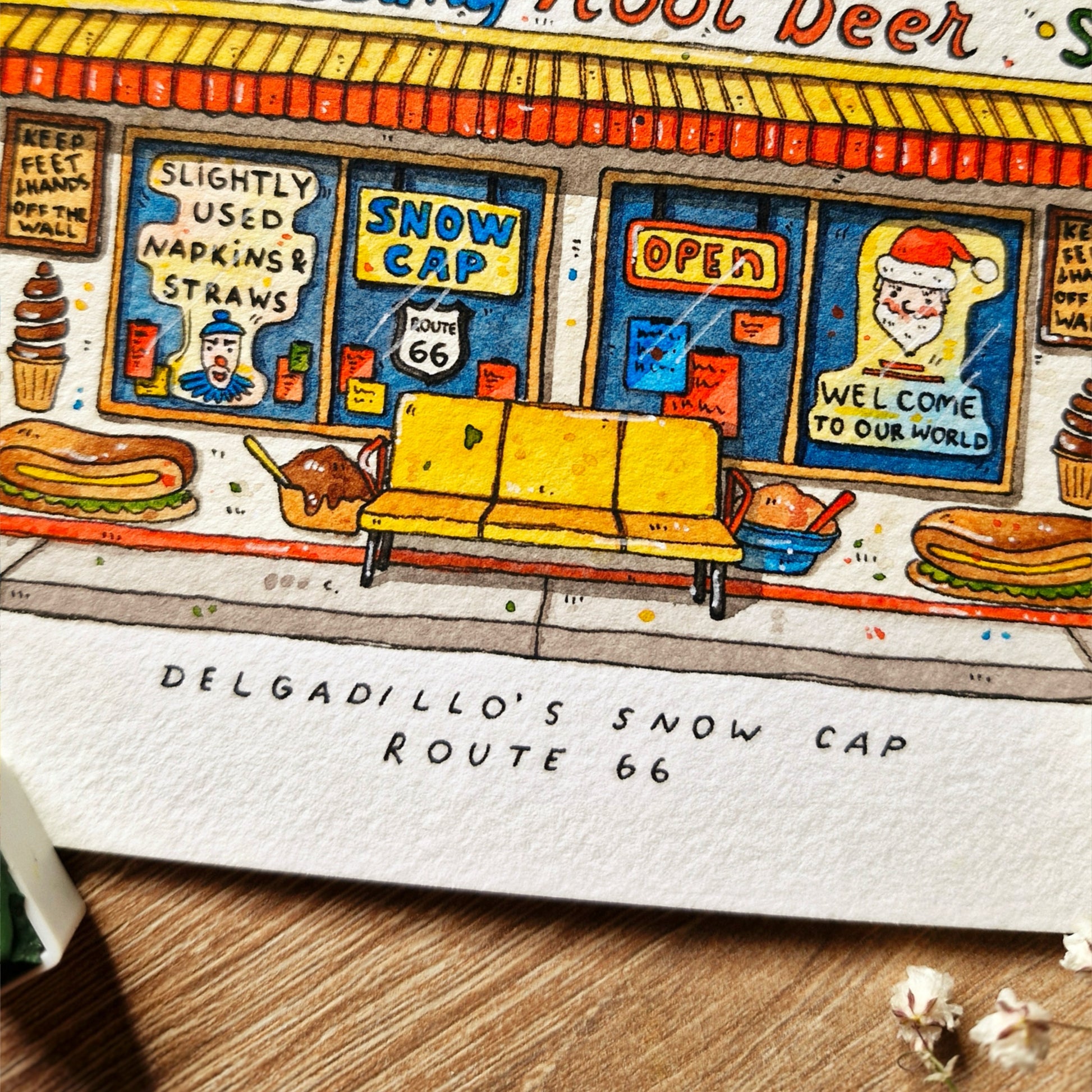 Illustration of a vintage-style ice cream shop with a yellow couch and 'Snow Cap' sign.