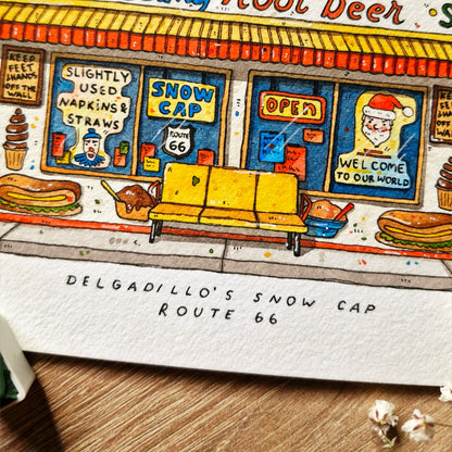 Illustration of a vintage-style ice cream shop with a yellow couch and 'Snow Cap' sign.