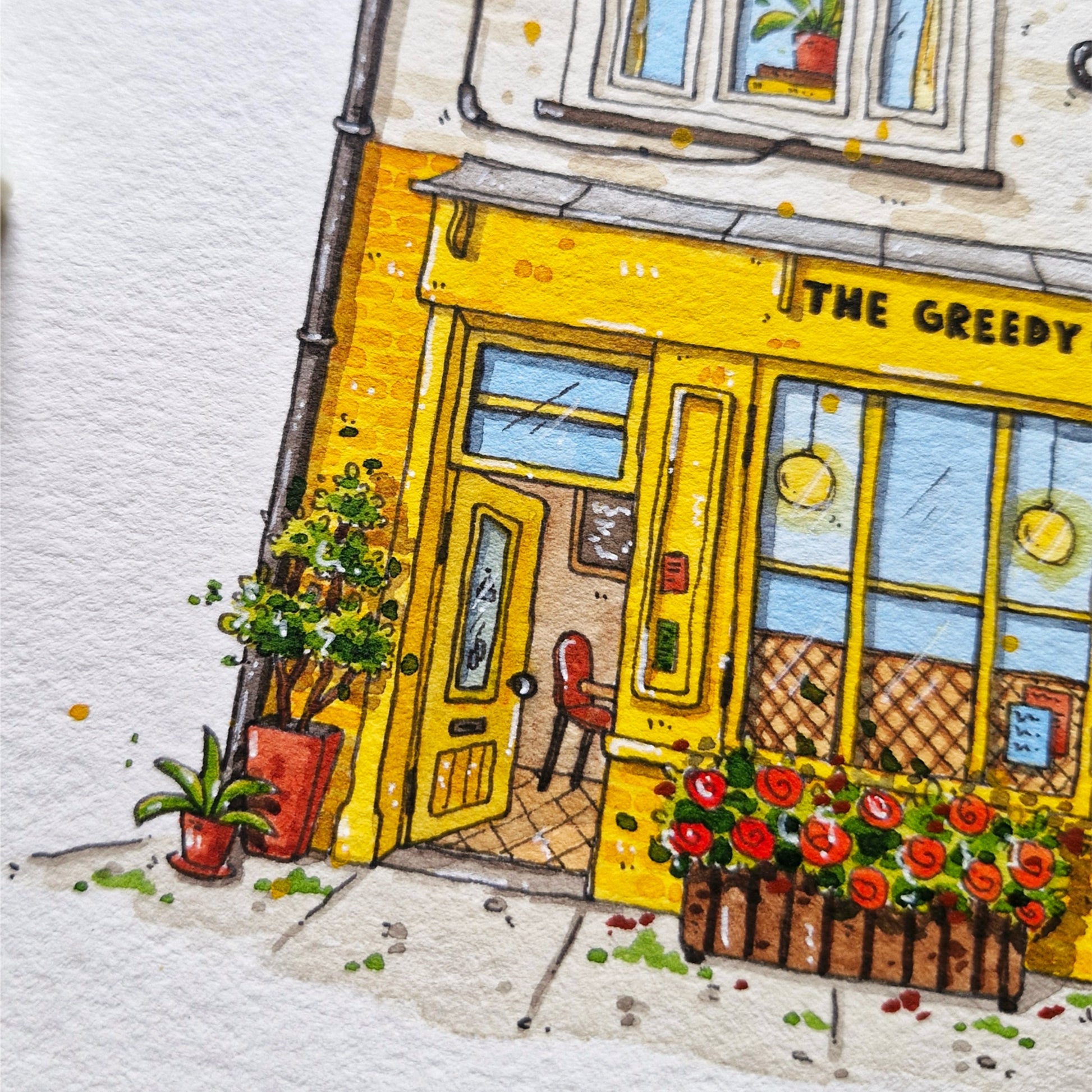 Illustration of a yellow building with 'The Greedy' sign, potted plants, and flowers.