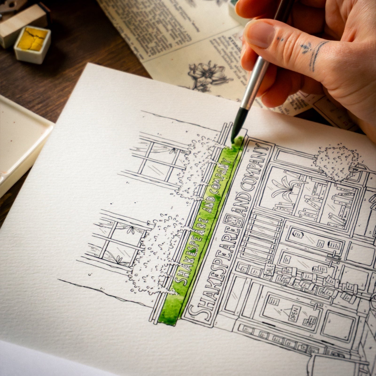 Person coloring a detailed illustration with a pen on a piece of paper.